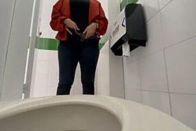Amateur camera records secretary in the bathroom