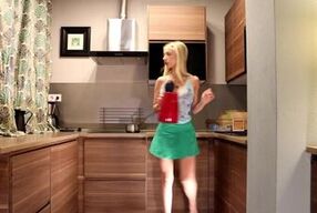 Sexy 18-year-old Latina flashes her legs and high heels in the kitchen while flashing her big tits and taking off her panties