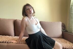 Beautiful student in a skirt stroking her body ????