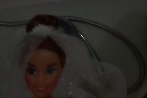Baby Sue masturbates in a wedding dress with cum on her face. Playing with dolls..mp4