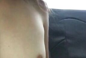 Hot and horny girl records herself in the back of the car masturbating and touching herself