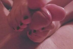 perfect footjob toejob with her perfect cute toes black nail polish and cums hard