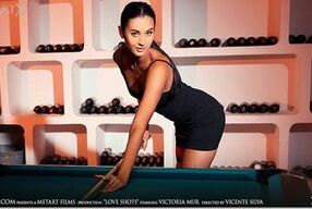 Stunning girl masturbates while playing pool without panties