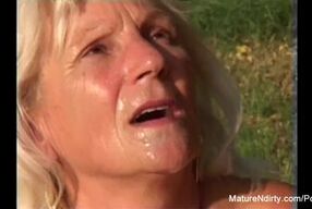 Blonde grandma gets some cum on her glasses