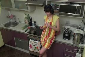 Petite short-haired housewife in high heels rubs her hairy cunt on the kitchen counter